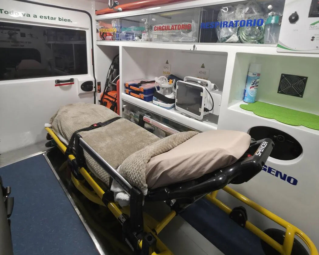 Equipped ambulance interior: stretcher, monitor and life support equipment